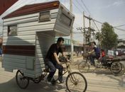 Empresa inventa bicicleta-casa na China