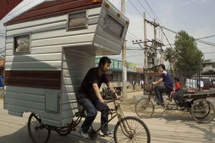 Empresa inventa bicicleta-casa na China