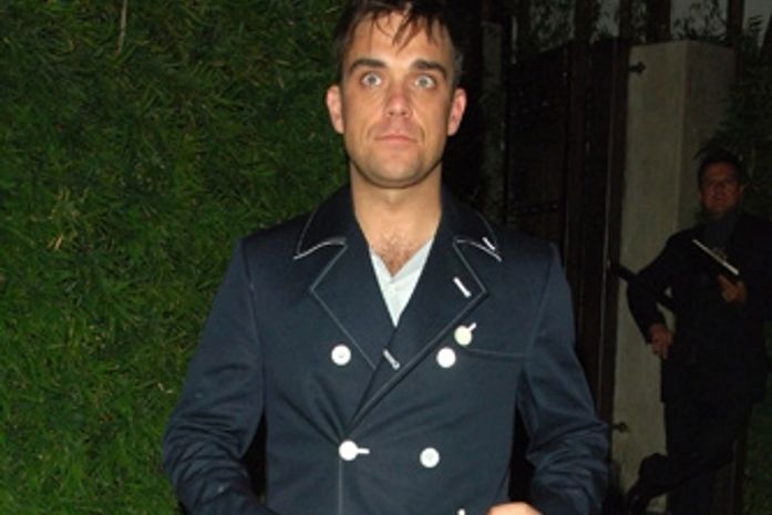 Solidariedade: Robbie Williams vai adotar uma criança do Haiti