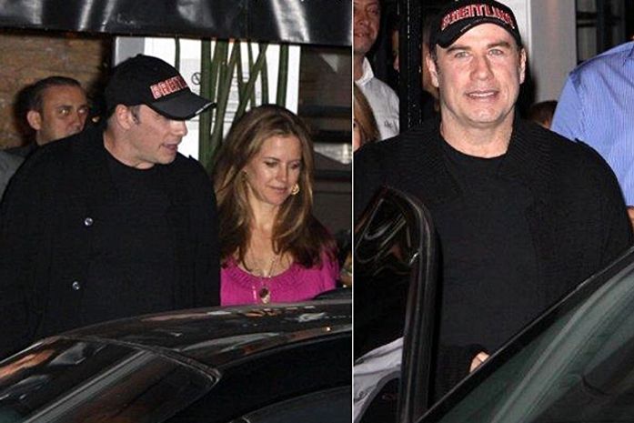 John Travolta com a mulher no restaurante