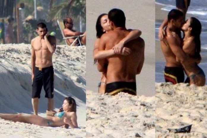 Grazi comemora 28 anos com beijão de Cauã na praia