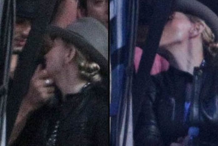 Beijoca: Madonna e Jesus Luz trocam carinhos durante show
