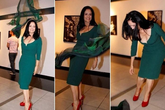 Animada com o véu, Sônia Braga fez a festa para os jornalistas e fotógrafos