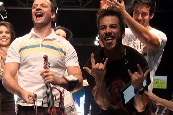 Junior Lima entre Amon-Rá e Sérgio Marone em recente evento