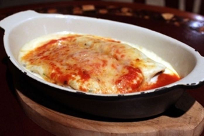 Lasanha com recheio de cogumelos com molho branco e muito queijo