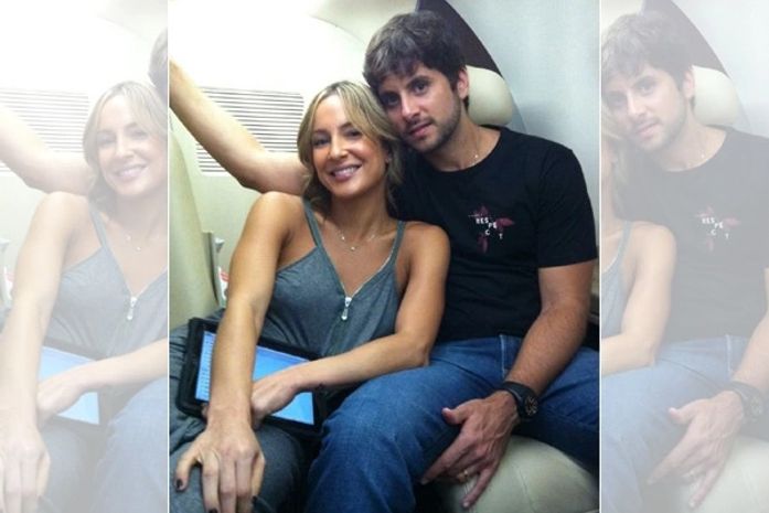 Claudia Leitte viaja grudadinha no marido, e posta foto