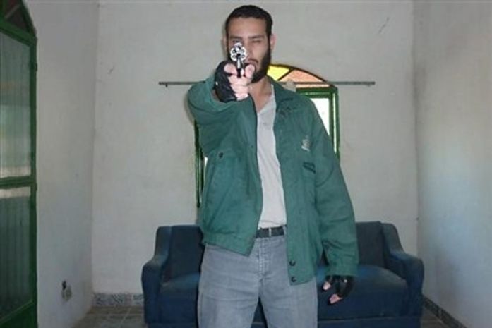 Atirador de Realengo possuia  fotos em computador pessoal empunhando armas