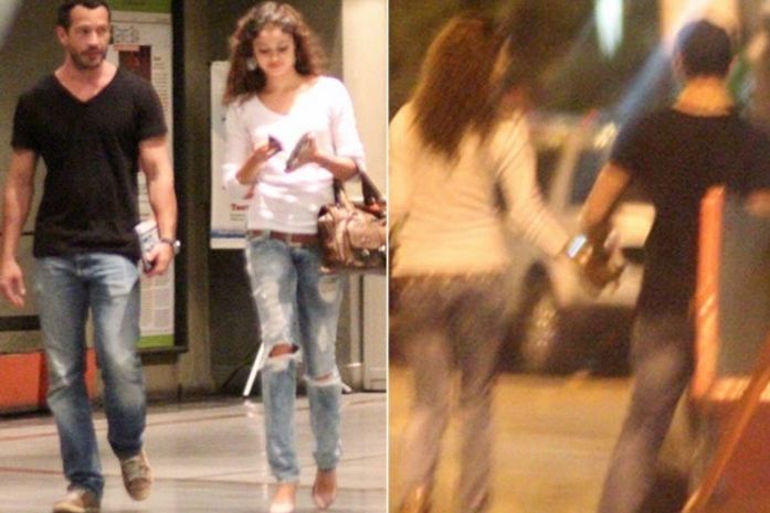 Malvino Salvador e Sophie Charlotte são fotografados de mãos dadas