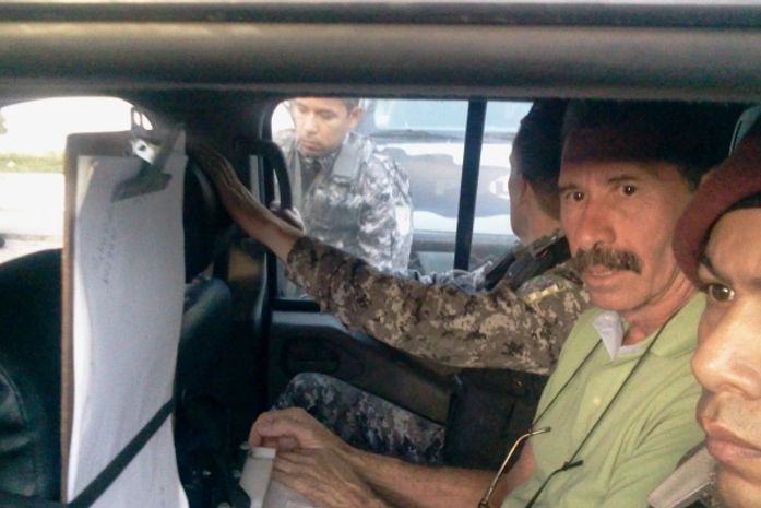 Ex-Coronel Cavalcante saindo da Central de Polícia