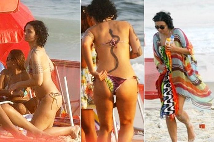 Filha de Vera Fischer vai à praia e exibe tatuagem de cobra nas costas