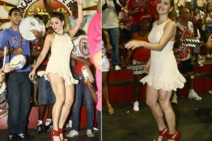 Monique Alfradique usa vestido curtinho em noite de samba