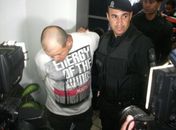 Gil chegando à Central de Polícia