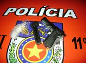 Pistola apreendida coma cusado
