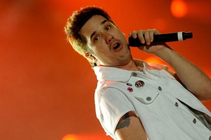Rogério Flausino canta com o Jota Quest na edição de 2011 do Rock in Rio 