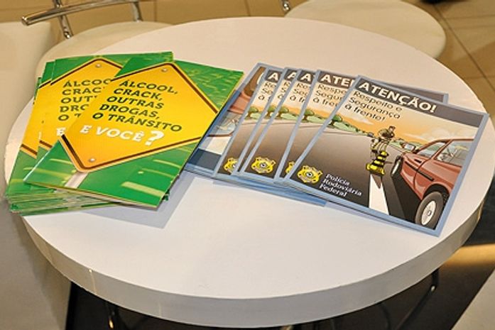 Folders distribuídos para o visitante