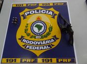 Arma apreendida com os assaltantes