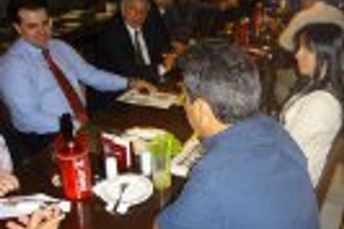 Marcelo Brabo com os advogados corretores.