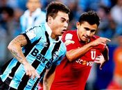 Grêmio sofre, vê queda de alambrado, mas elimina LDU