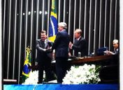 Empresário José alexandre quando recebia a comenda no Senado das mãos de Collor e Renan