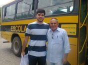 Secretário de Educação, Luiz Pedro (camisa listrada)