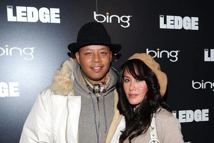 O ator Terrence Howard ao lado da mulher, Michelle Gant, em evento em janeiro de 2011
