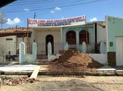 Faixa compara Marcos Santos a Jesus Cristo