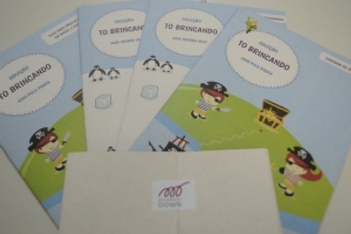 Cartilha ajuda pais em brincadeiras adaptadas para filhos com síndrome de Down