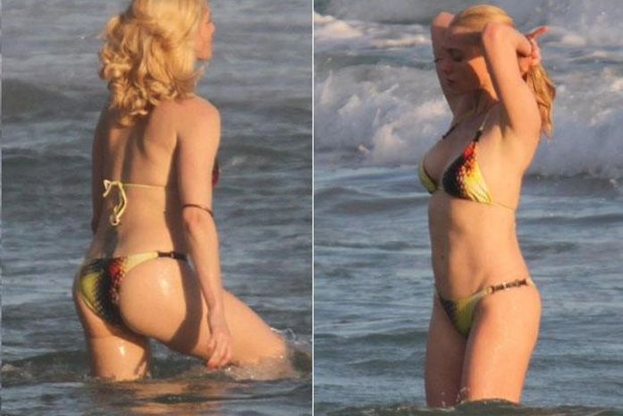 De biquíni, Letícia Spiller faz exercícios e curte mar no Rio