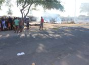 Morador da Favela Sururu de capote