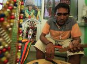 Guerreiros e mestres da cultura popular em exposição de fotos na praça do Centenário