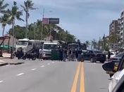 Funcionários realizam protesto por salários atrasados e interditam principal via da orla de Maceió