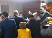 Deputado é aplaudido de pé e gera tumulto após chegar à Câmara com leitões assados