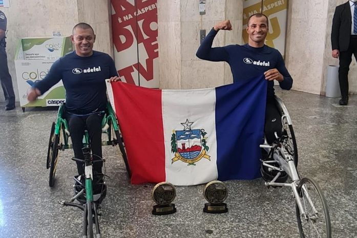Carlos Antônio Guedes e Givaldo Augusto dos Santos levaram o nome de Alagoas ao pódio, neste sábado (31), na modalidade Atletas Cadeirantes, na 97ª Corrida Internacional de São Silvestre.