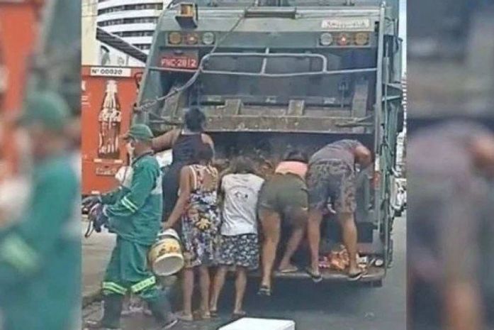 “Cenas como essa se repetem no Brasil todos os dias”, diz cientista social sobre busca de comida no lixo