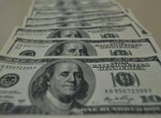Alívio no mercado externo faz dólar cair para R$ 5,72
