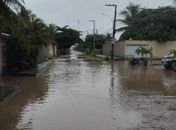 Inundação em rua residencial, em Marechal Deodoro 