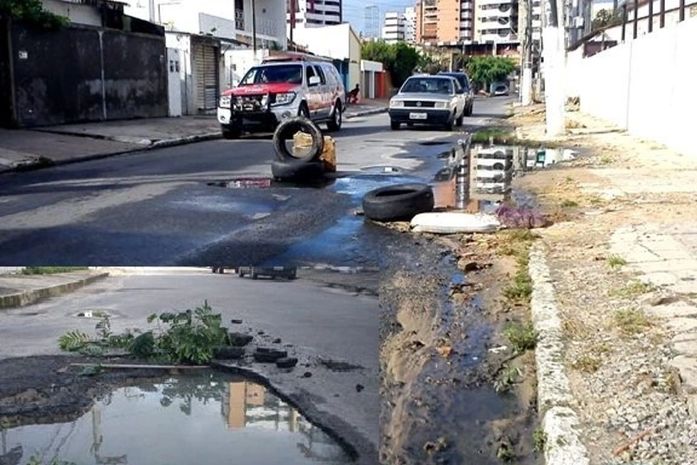 Rua esburacada em Maceió