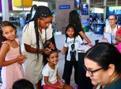 Tranças afro aproximam público e cultura no estande da Secult na Bienal Internacional do Livro