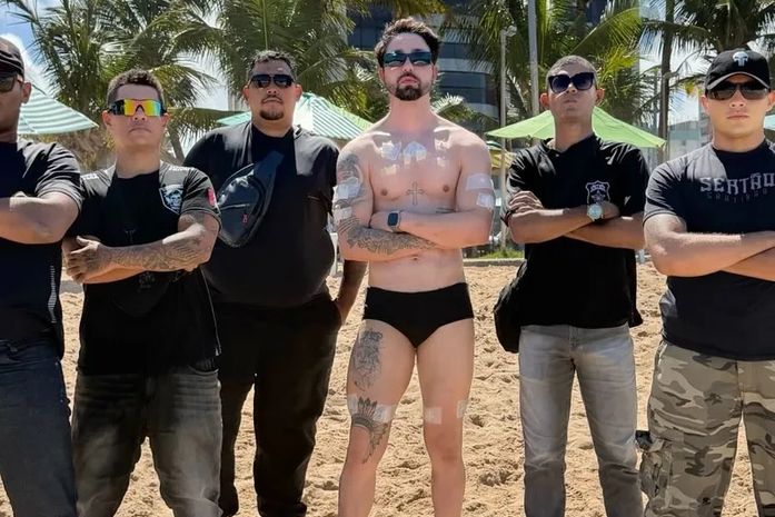 Rico Melquiades aparece cercado por cinco seguranças em praia de Maceió