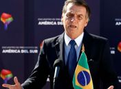 Jair Bolsonaro durante entrevista coletiva ao desembarcar em Santiago, Chile