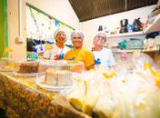 Renda extra no São João: Mulheres assistidas pelo Cras vendem culinária junina na Vila Massayó