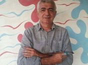 Jornalista e chargista Manoel Viana