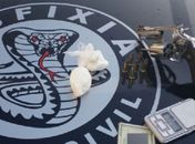 Foragido da Justiça é preso com revólver e drogas