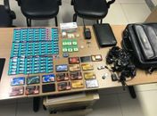 Material apreendido com irmãos suspeitos de fraudar concursos públicos