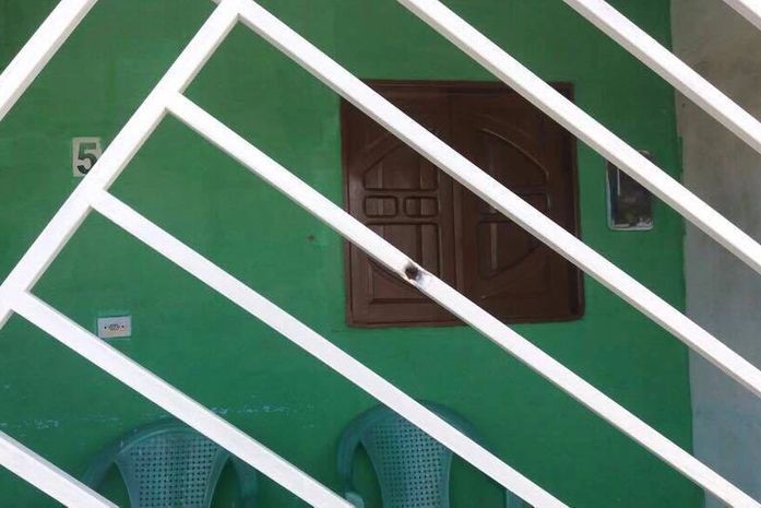 Marcas de tiro em residência