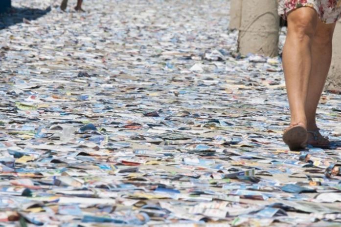 Propaganda impressa também polui o meio ambiente