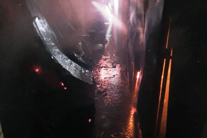 Bombeiros retiram família de imóvel e controlam incêndio em panificação