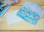 Máscaras de tecido produzidas por alunos do curso de bordado e renda são distribuídas em Maceió