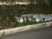 Vítima foi morta a tiros na entrada de conjunto