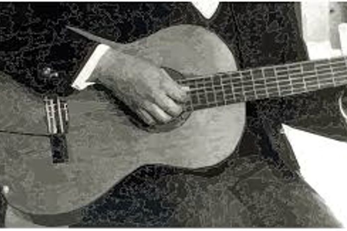 Era um artista beirando a velhice, com seu paletó puído,cheirando a tempo...